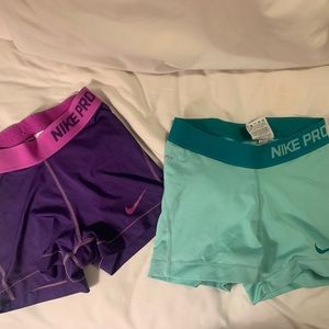 XS Nike Pro 3” spandex shorts (aqua and purple)
